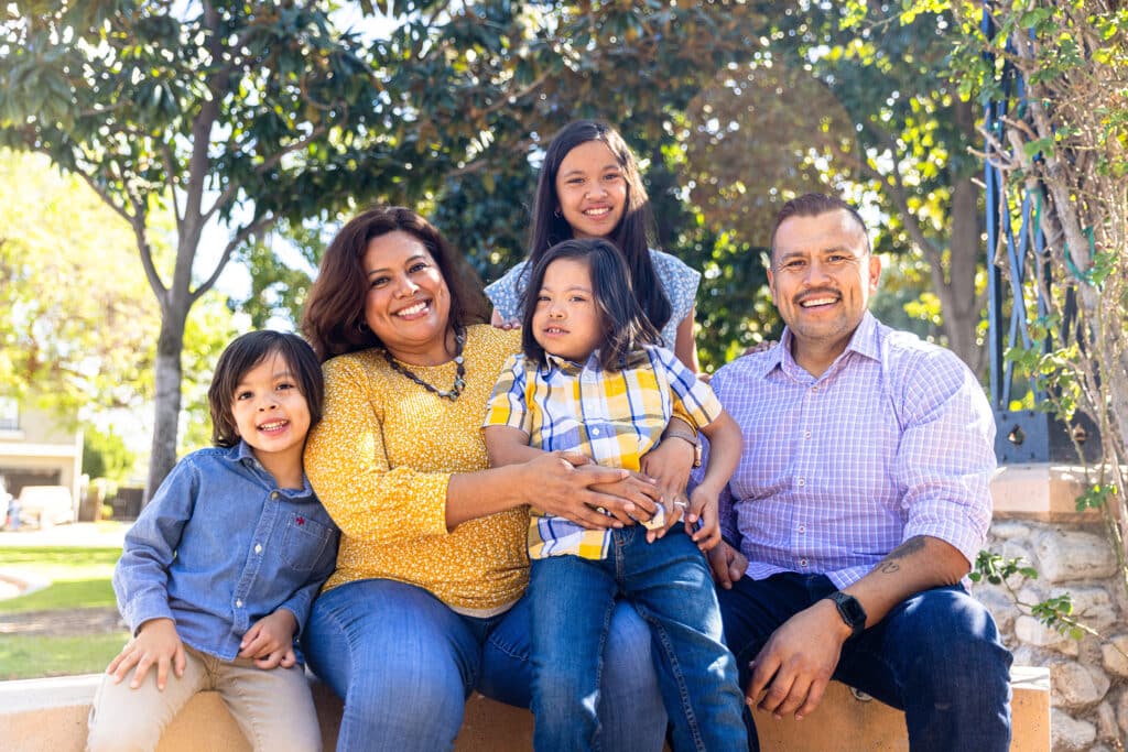 Young Mexican Family Portrait in the Park