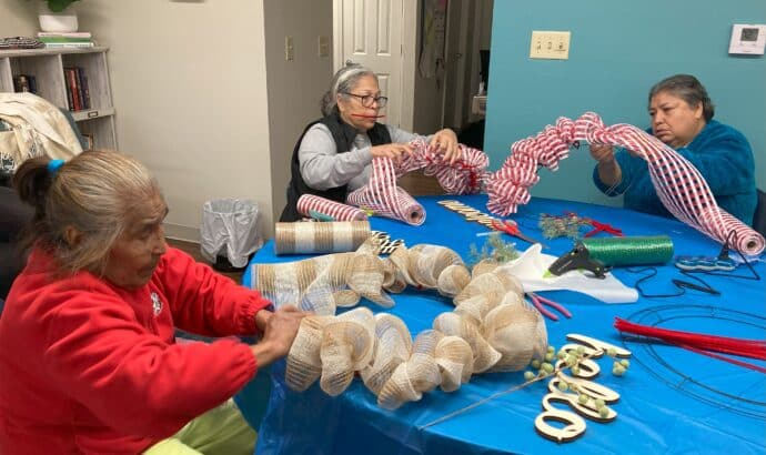 residents making wreaths